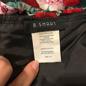 B. Smart Floral Dress with Red and Pink Accents